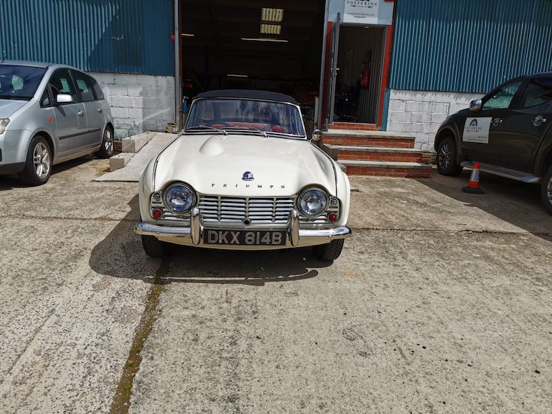 Fostering Classics - Triumph TR4 completed - in front of the workshop