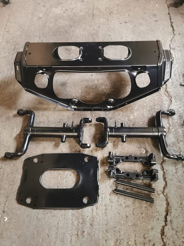 rear suspention components - silver jaguar e-type s3 - Fostering Classics