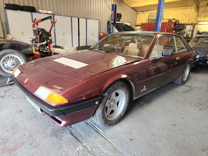 Ferrari 400i - side view - Fostering Classics