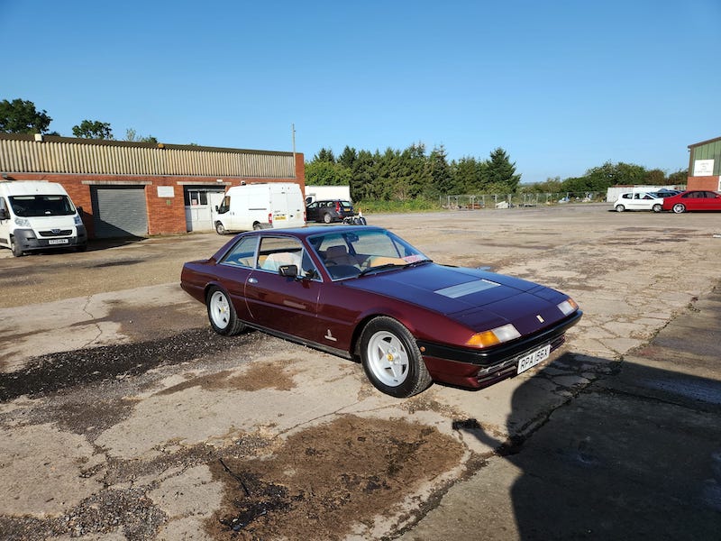 Ferrari 400i - driver side view - Fostering Classics