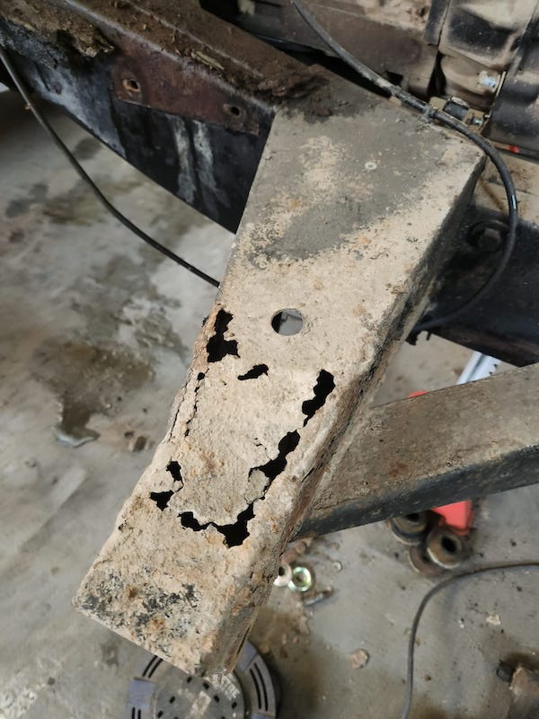 Land Rover Defender 90 - corroded chassis - Fostering Classics
